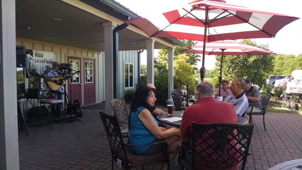 Listening to live music on a patio