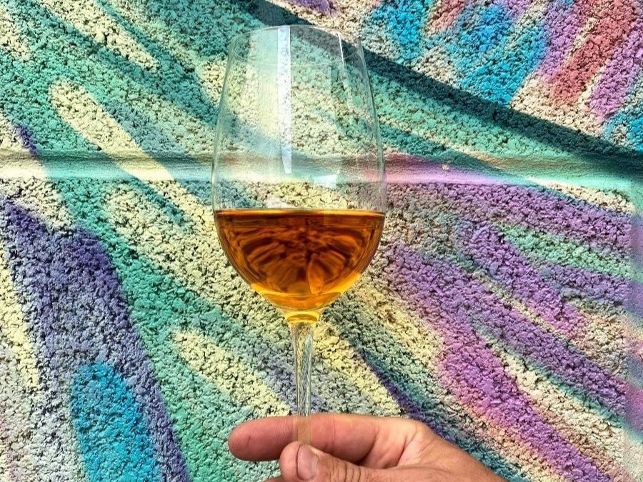 Glass of orange wine from Atwater Vineyards