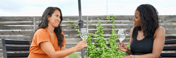 Two women with wine glasses