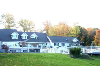 Book a stay at the Longhouse Lodge Motel and Manor - situated on a hill overlooking Seneca Lake