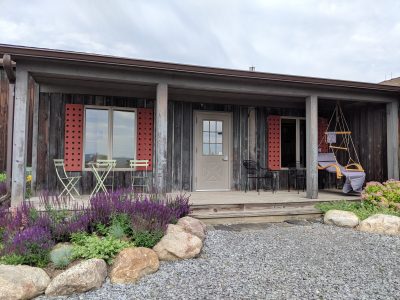 Exterior view of a rustic wooden building at Prejean Winery