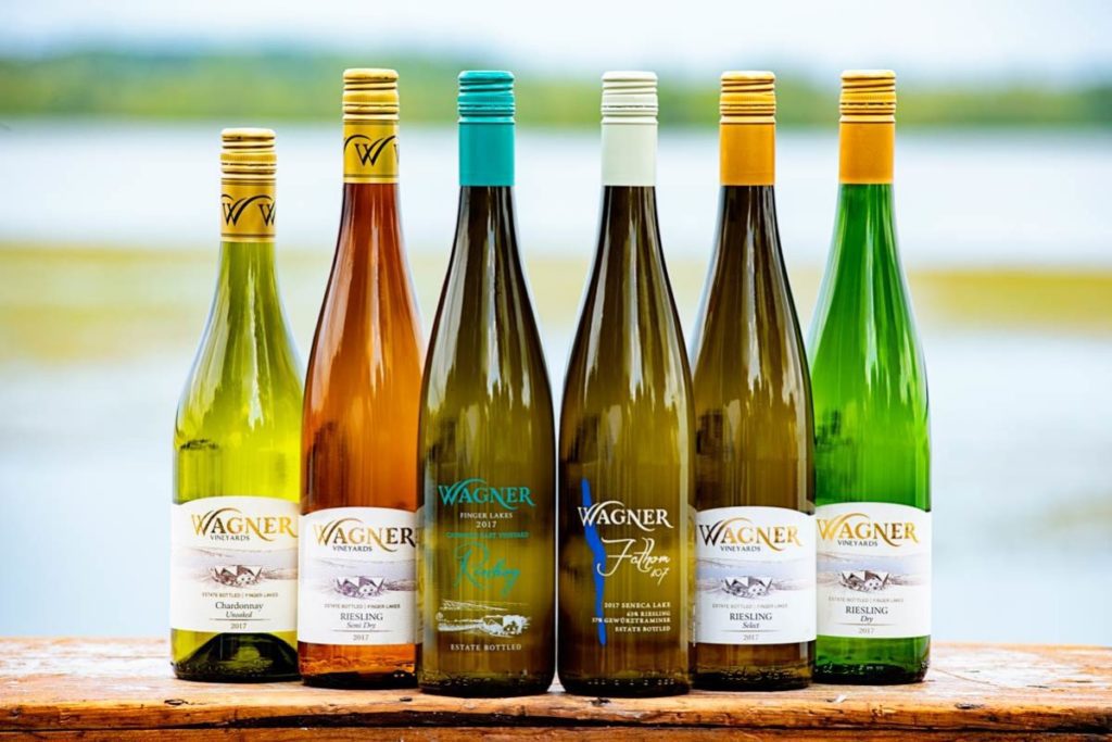 Assortment of wine bottles that can be purchased at Wagner Vineyards Estate winery